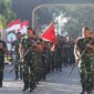 Usai pelaksanaan Upacara Bendera, Prajurit Yonarmed 1 Kostrad melaksanakan kegiatan lari bersenjata mengelilingi Asrama Yonarmed 1 Kostrad, Singosari, Malang, Senin (25/08/2025). (foto: Penajusta/Narwan) 